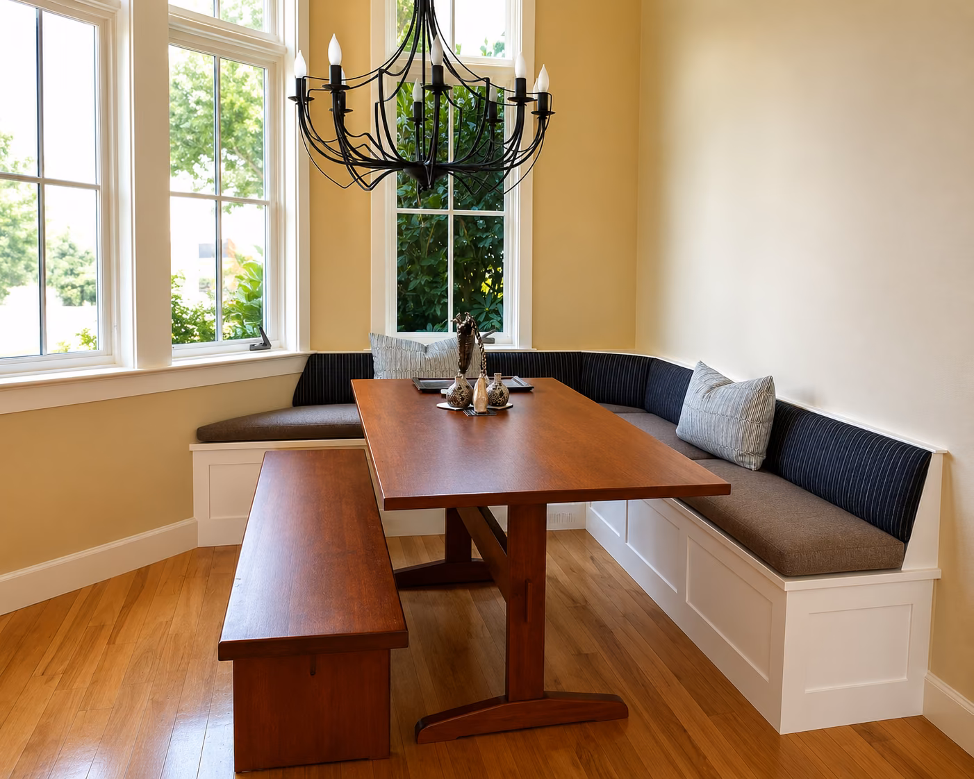 A custom corner dining banquette with tailored cushions by Master&rsquo;s Touch Upholstery, Santa Rosa, CA